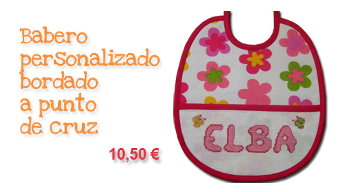 Babero bordado a punto de cruz