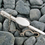 Regalos  para hombres: Pisacorbata de plata personalizado