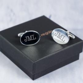 Gemelos de plata con iniciales grabadas