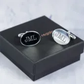 Gemelos de plata con iniciales grabadas