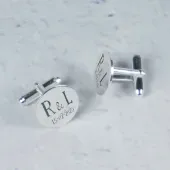 Gemelos redondos de plata grabados