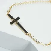 Pulsera cruz personalizada ba&ntilde;ada en oro