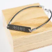 Pulsera de acero y cuero personalizada 'Latidos'
