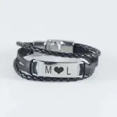Pulsera grabada de acero y piel