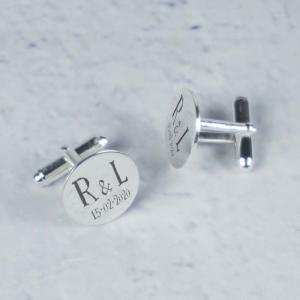Gemelos redondos de plata grabados