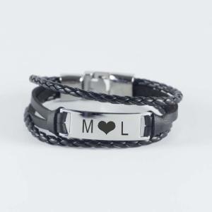 Pulsera grabada de acero y piel