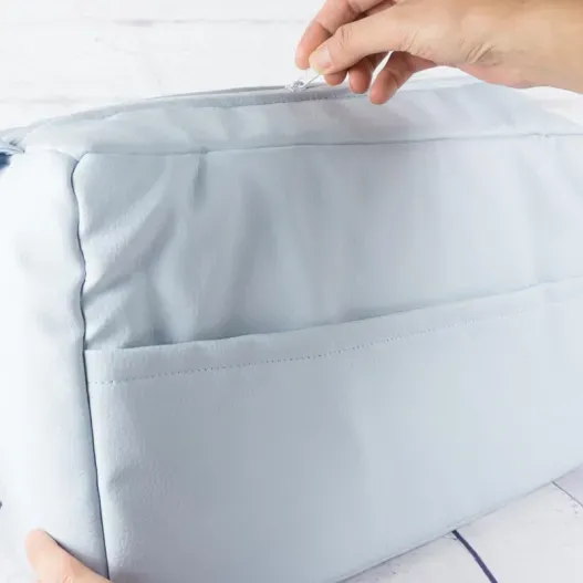 Bolso para carrito con nombre bordado (Detalle de presentación)