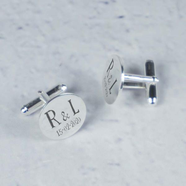 Gemelos redondos de plata grabados