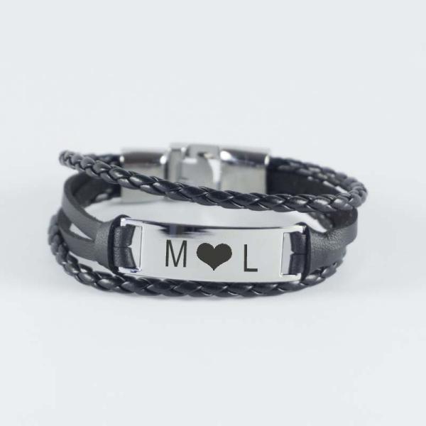 Pulsera grabada de acero y piel