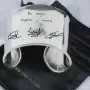 Regalos personalizados: Joyas personalizadas: Brazalete de plata personalizado con firmas