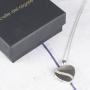 Regalos personalizados: Joyas personalizadas: Colgante coraz&oacute;n de plata grabado para 2 fotos