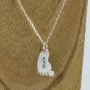 Regalos personalizados: Joyas personalizadas: Colgante de plata pie de beb&eacute; personalizado