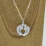 Colgante de plata pies de bebé personalizados