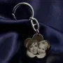 Regalos personalizados: Llaveros personalizados: Llavero flor grabado