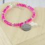 Pulsera 'Comunión' de piedras rosas personalizada