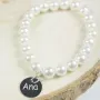Regalos personalizados: Joyas personalizadas: Pulsera perlas con medalla de plata grabada