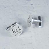 Gemelos redondos de plata grabados