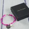 Joyas personalizadas: Pulsera 'Comunión' de piedras rosas personalizada