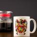 Taza con escudo heráldico