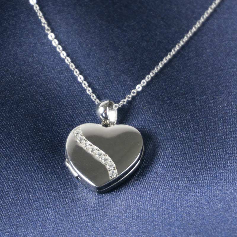 Regalos personalizados: Joyas personalizadas: Colgante corazón de plata grabado para 2 fotos