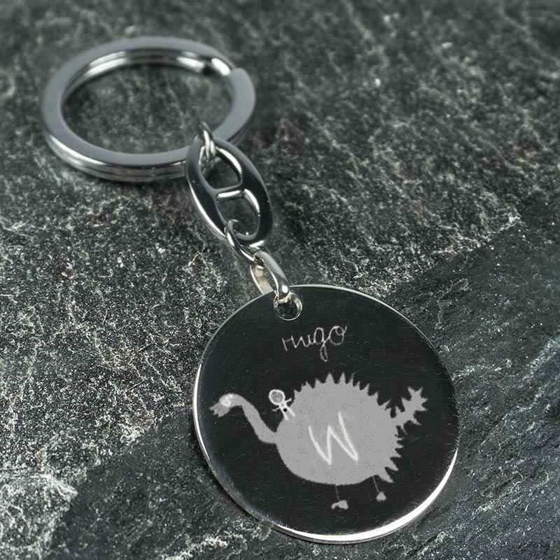 Regalos personalizados: Llaveros personalizados: Llavero de plata con el dibujo de tu hijo grabado